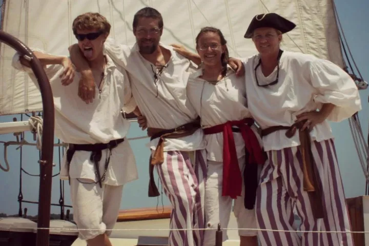 a group of people posing for the camera