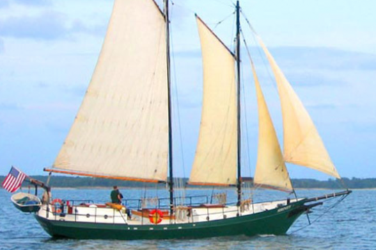 a small boat in a body of water